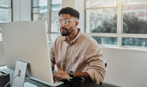 Global HR manager researching payroll tax in Rwanda
