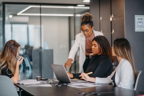 Group of women working together in a modern office