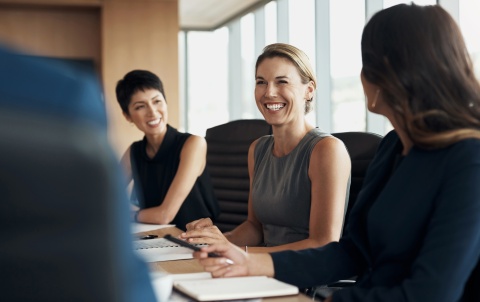 Coworkers discuss how to get legal work authorization in Germany