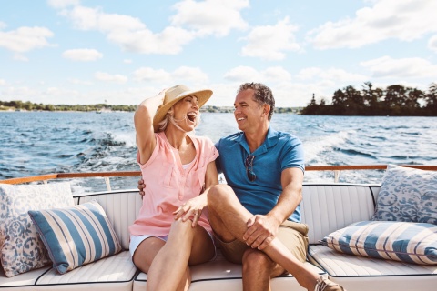 A mature couple enjoying a relaxing boat ride during a Honduran public holiday