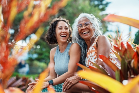 Two women spending time together outdoors, celebrating a public holiday in Fiji
