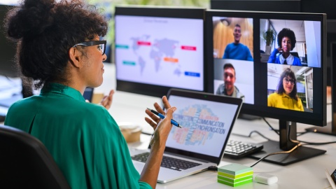 CEO hosting a virtual meeting for her global team