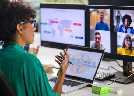 CEO hosting a virtual meeting for her global team
