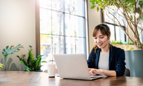 Global HR manager researching performance improvement plans for remote employees