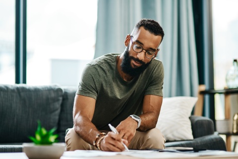 Employee reviewing invoice payment terms to ensure timely payment