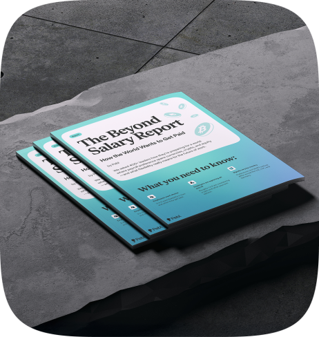 3x copies of Pebl’s The Beyond Salary Report laying stacked on a concrete bench. 